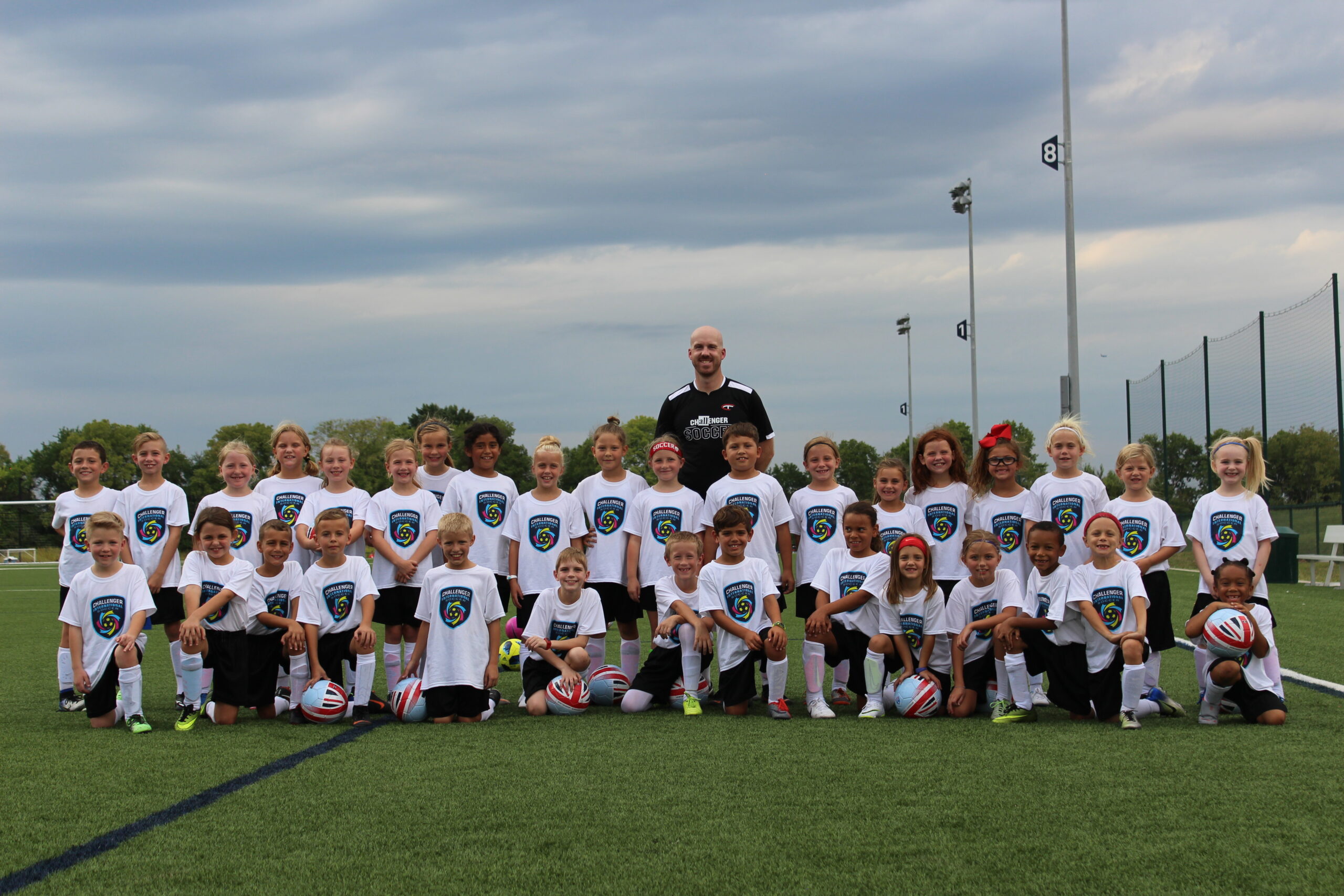 Challenger Sports Soccer Camp Group Photo of Players and Coaches