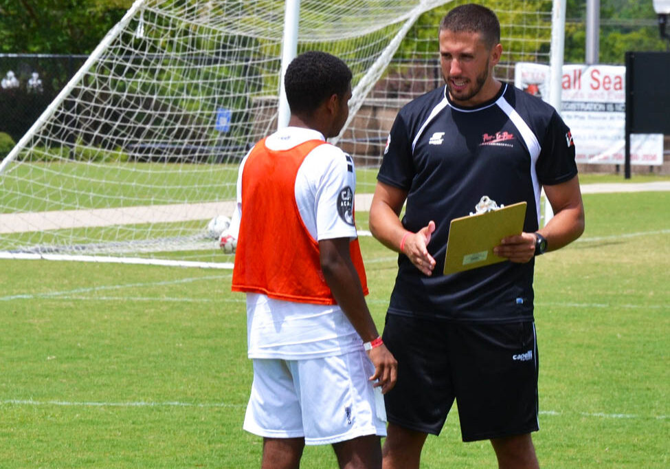 Coach chatting directly with soccer player on Elite Camp