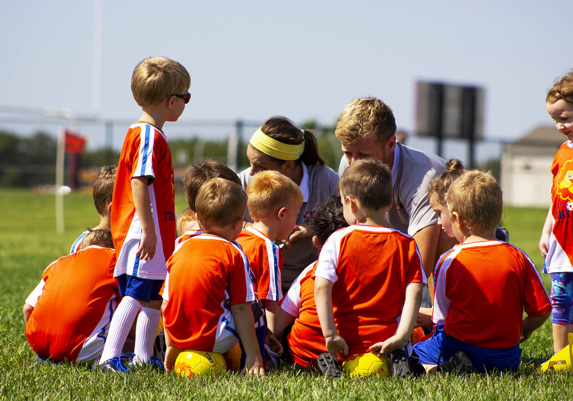 TinyTykes Group Photo of young players with coaches