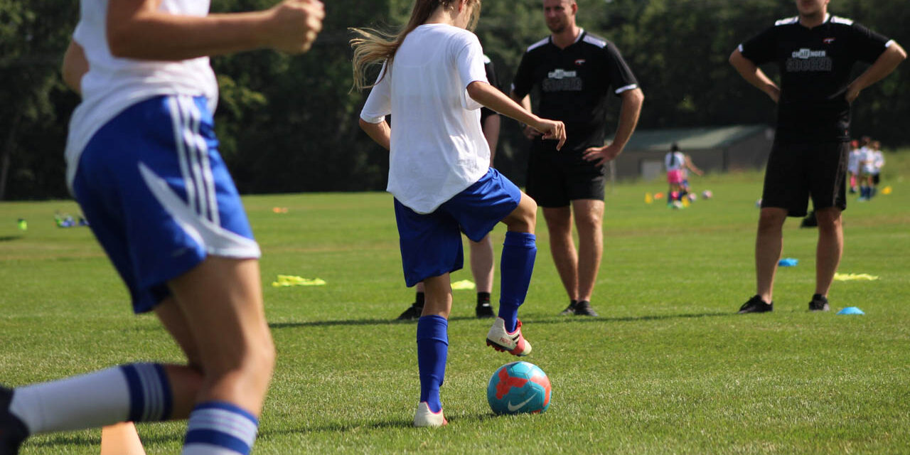 Players doing drills with coaches